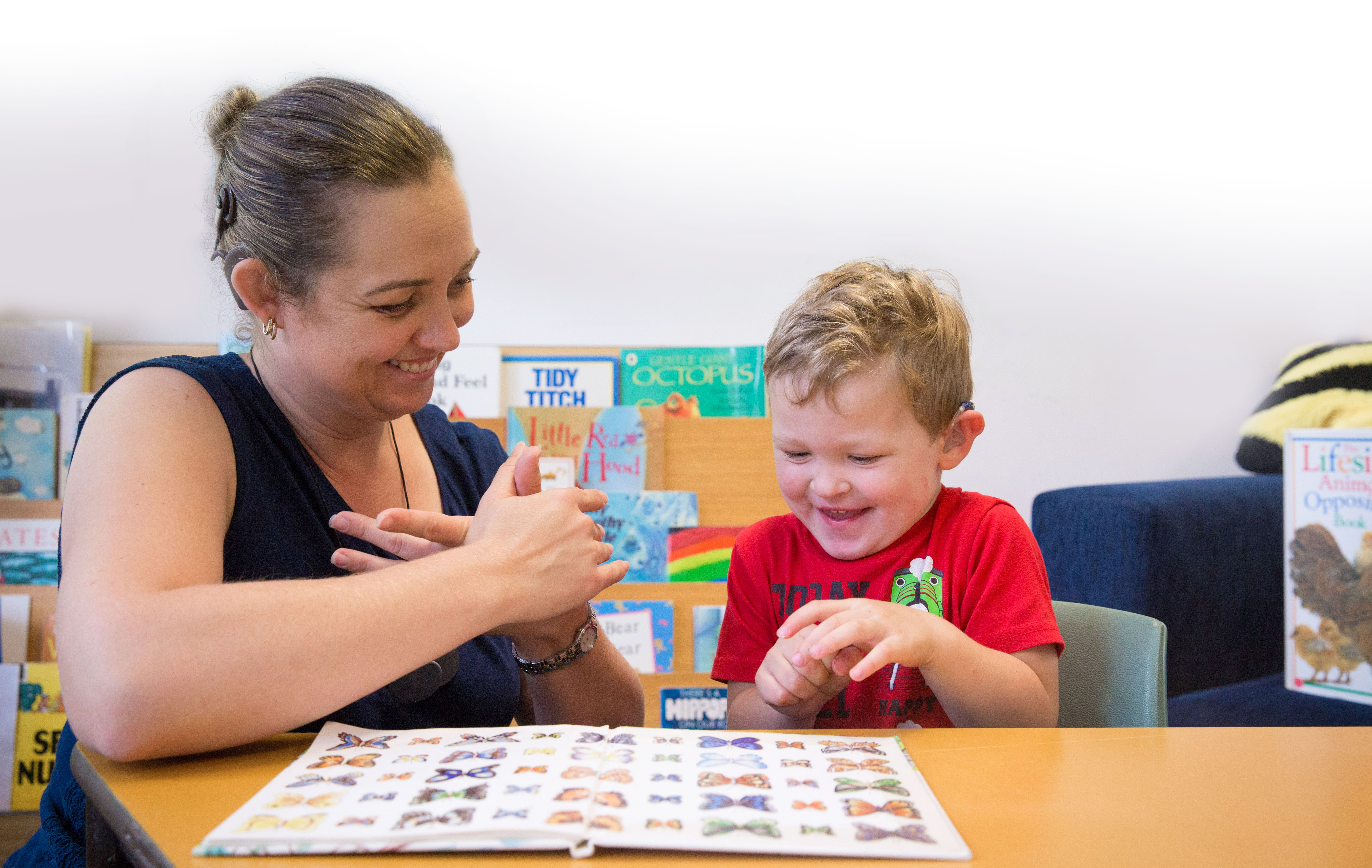 Adult and child signing